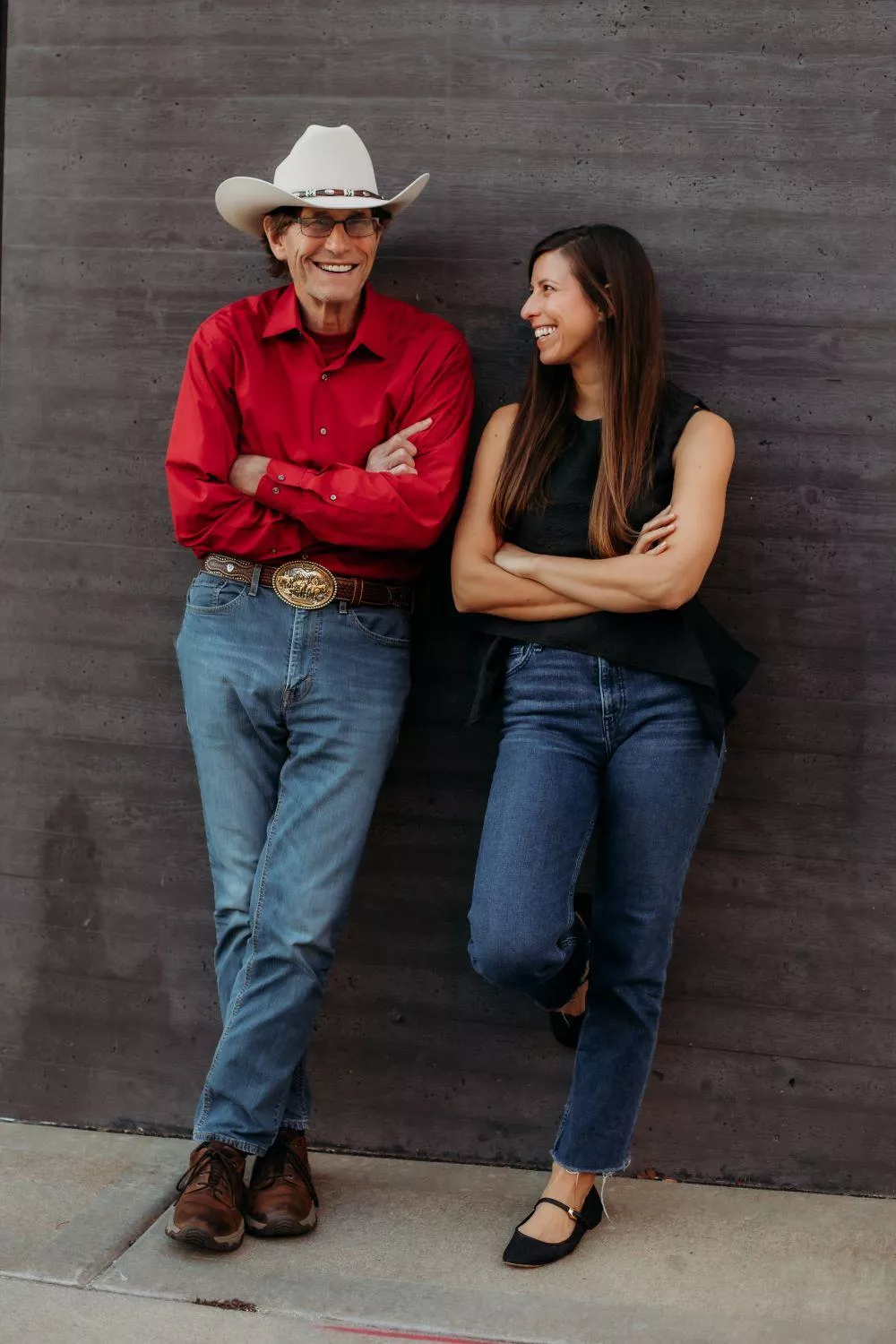 Charlie Horan and Mary Horan McBride standing against a wall