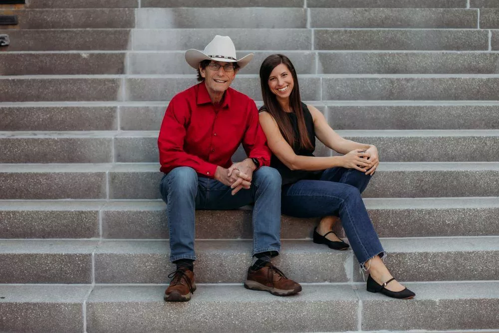 Charlie Horan and Mary Horan McBride sitting on steps